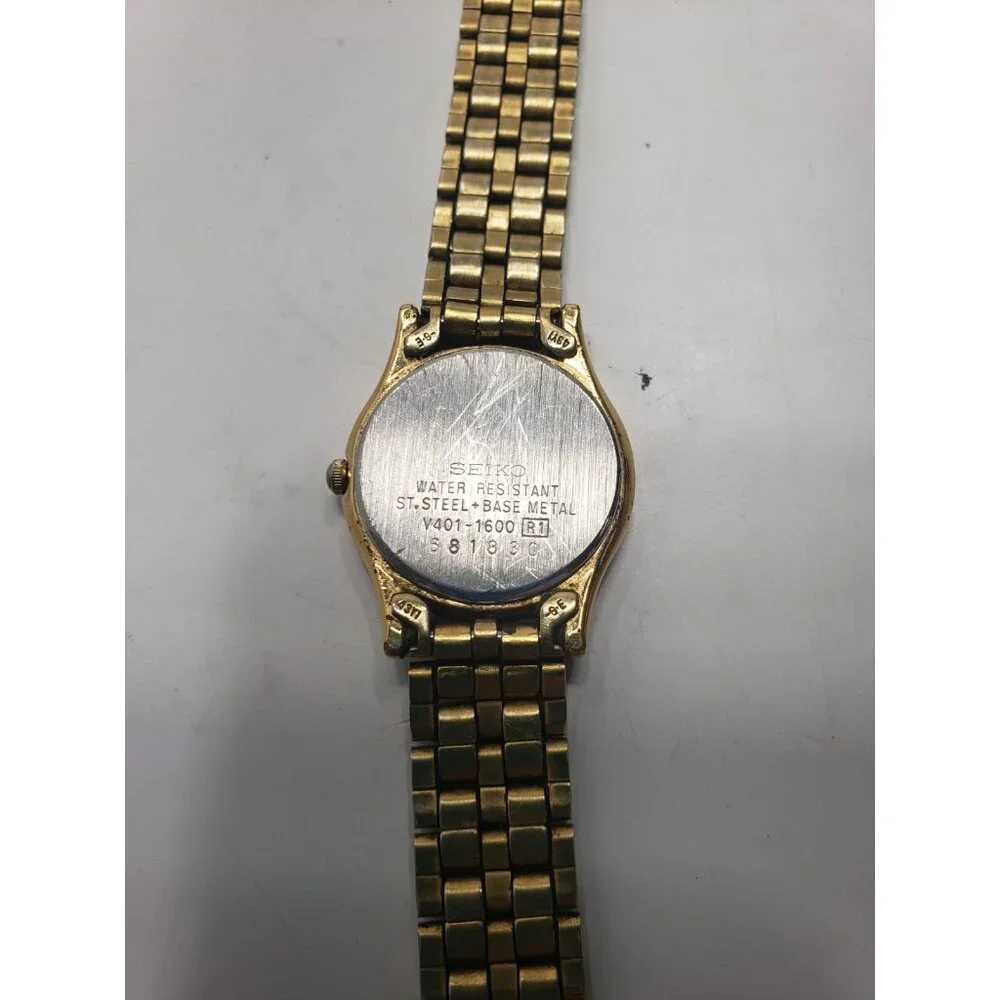 Vintage Seiko V401-1600 Women’s Quartz 24mm Black Dial Gold Tone Wristwatch